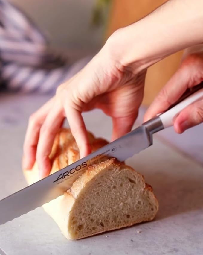 Arcos Bread Knife 8 Inch Nitrum Stainless Steel and 200 mm blade. Obtain a great variety of cuts for your food. Ideal knife for daily domestic use. Series Riviera Blanc. Color White.