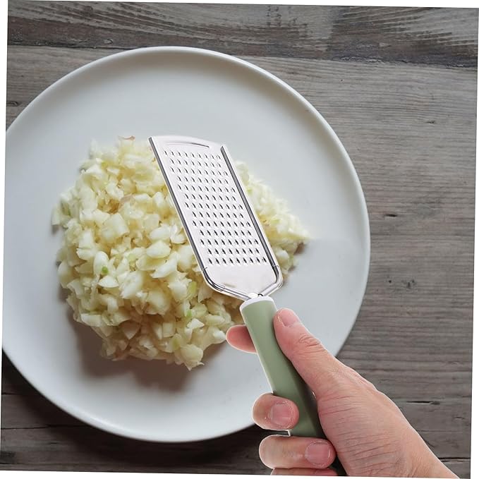 Unomor Stainless Steel Multifunctional Garlic Zester and Vegetable Chopper Efficient Grating Tool for Garlic Ginger and Cheese Easy to Clean and Lightweight Design for Kitchen Use