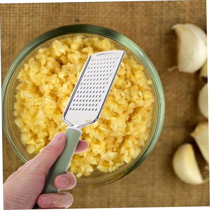 PRETYZOOM Stainless Steel Handheld Zester Multifunctional Garlic Mincer Tool with Ergonomic Handle for Efficient Grating of Garlic Ginger and Cheese Lightweight Kitchen Accessory