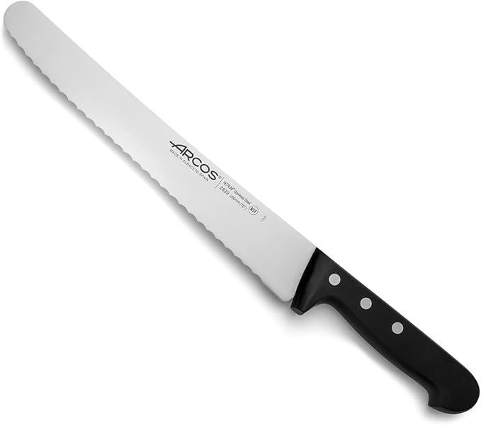Arcos Pastry Knife/Cake Knife 10 Inch Nitrum Stainless Steel and 250 mm blade. Ergonomic Polyoxymethylene POM Handle. Polypropylene core with soft rubber coating. Series Universal. Color Black