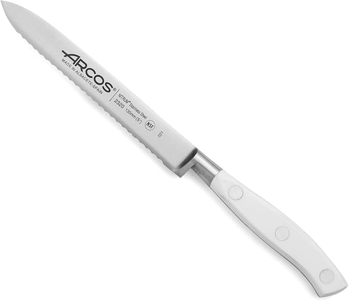Arcos Forged Knife Serrated 5 Inch Nitrum Stainless Steel and 130 mm blade. Ergonomic Polyoxymethylene POM Handle. Series Riviera Blanc. Color White