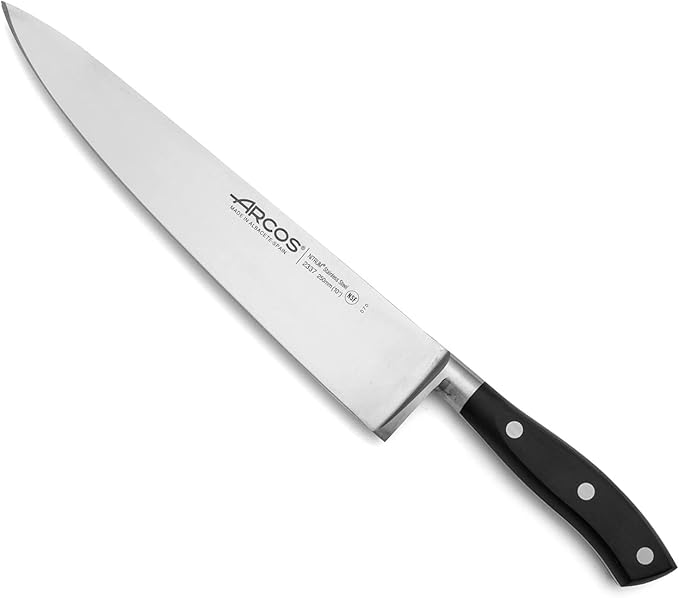 Arcos Forged Chef Knife 10 Inch Stainless Steel. Sharp Professional Cooking Knife for Cutting Meat. Ergonomic Polyoxymethylene Handle and 250mm Blade. Series Riviera. Color Black