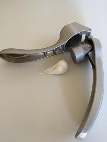 Pampered Chef Garlic Press 2575 - Easy Squeeze, Rust Proof, Ergonomic Handle - Professional Garlic Mincer & Ginger Press with Handy Cleaning Brush