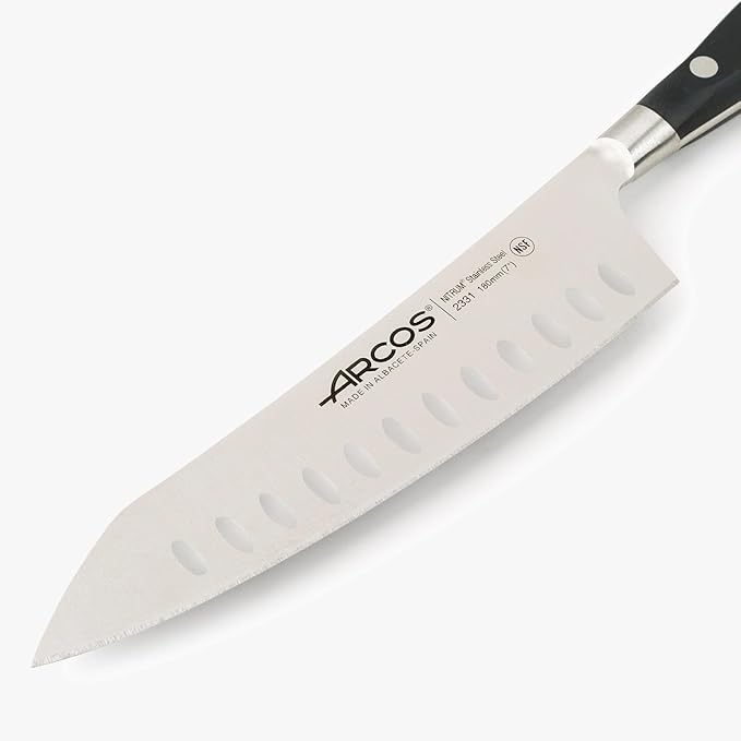 ARCOS Rocking Santoku Knife 7 Inch Stainless Steel. Japanese Professional Kitchen Knife for Cutting Fruits and Vegetables. Ergonomic Black Handle. Series Riviera Blanc