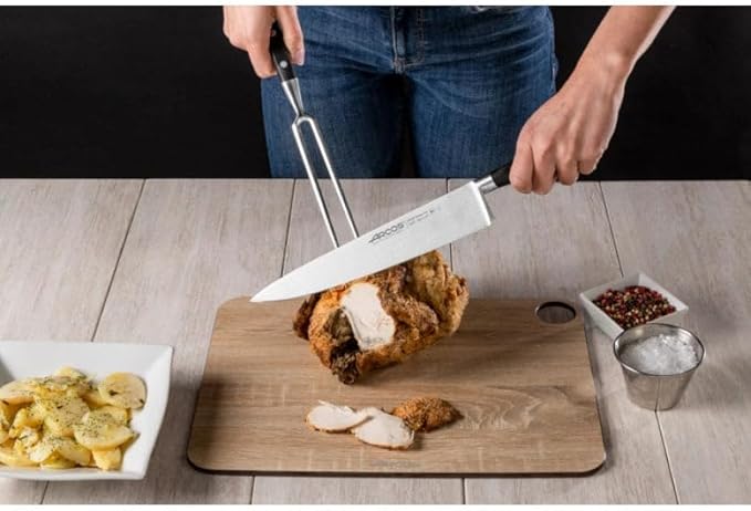 Arcos Forged Carving Fork 7 Inch Nitrum Stainless Steel. 180 mm Blade. Very useful utensil that provides absolute stability for chopping roast meat with a carving knife. Series Riviera. Color Black