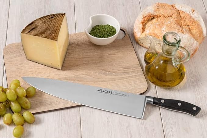 Arcos Forged Chef Knife 12 Inch Stainless Steel. Multi-use Professional Cooking Knife for Cutting Meat and Vegetables. Ergonomic Polyoxymethylene Handle and 300mm Blade. Series Riviera. Color Black