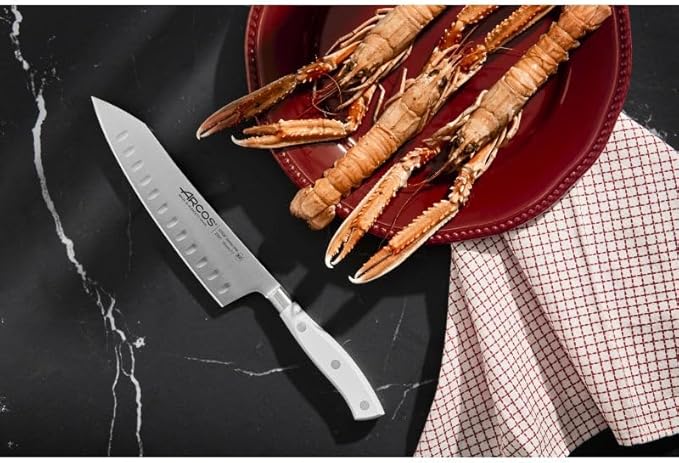 ARCOS Rocking Santoku Knife 7 Inch Stainless Steel. Japanese Professional Kitchen Knife for Cutting Fruits and Vegetables. Ergonomic White Handle. Series Riviera Blanc