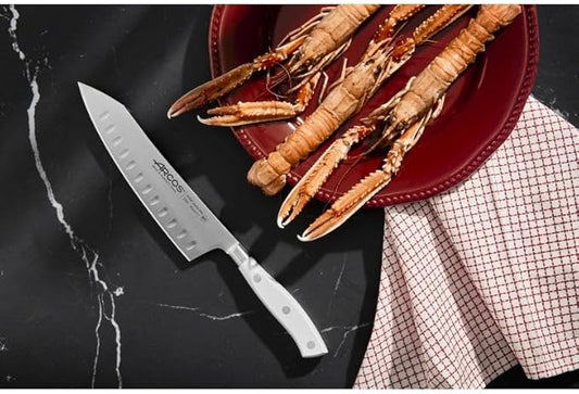 ARCOS Rocking Santoku Knife 7 Inch Stainless Steel. Japanese Professional Kitchen Knife for Cutting Fruits and Vegetables. Ergonomic White Handle. Series Riviera Blanc