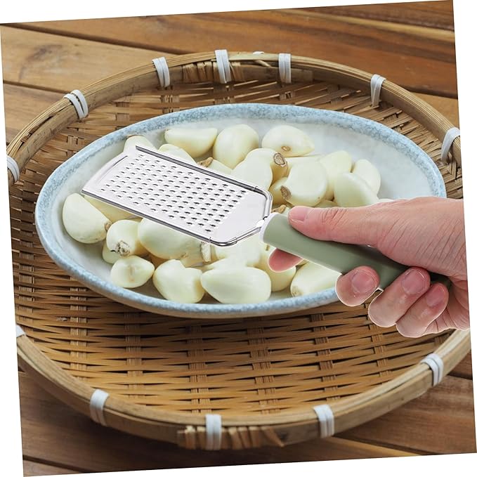 GLEAVI Stainless Steel Handheld Zester and Garlic Mincer Versatile Kitchen Tool for Grating Cheese Garlic and Chopping Vegetables Easy to Clean and Efficient Grating for Everyday Cooking