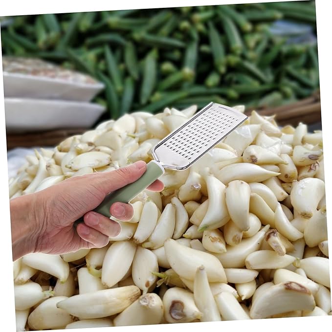 PRETYZOOM Stainless Steel Handheld Zester Multifunctional Garlic Mincer Tool with Ergonomic Handle for Efficient Grating of Garlic Ginger and Cheese Lightweight Kitchen Accessory