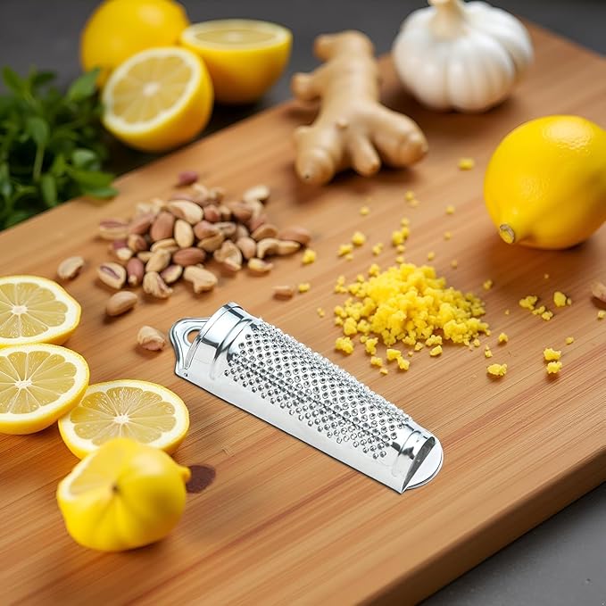 Silver Multifunctional Kitchen Stainless Steel Ginger Garlic Nutmeg Grater Nut Walnut Lemon Hand Planer Tool Lemon ZesterDurable and Professional Kitchen Tool Garlic Presses