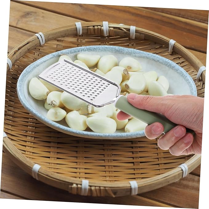 PRETYZOOM Multifunctional Garlic Shredder and Cheese Zester 1-Piece Stainless Steel Garlic Press for Chopping Vegetables Cooking and Lemon Grating for Home Use