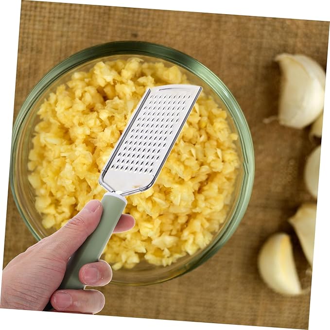 GLEAVI Stainless Steel Handheld Zester and Garlic Mincer Versatile Kitchen Tool for Grating Cheese Garlic and Chopping Vegetables Easy to Clean and Efficient Grating for Everyday Cooking