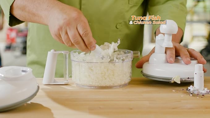 Foodini Manual Vegetable Cutter & Food Processor - Veggie Chopper, Mincer for Garlic, Onion, Herbs & Nuts - Includes Slicer, Julienne Blade, Juicer, Egg Separator - Easy Spin Handle - Easy to Clean