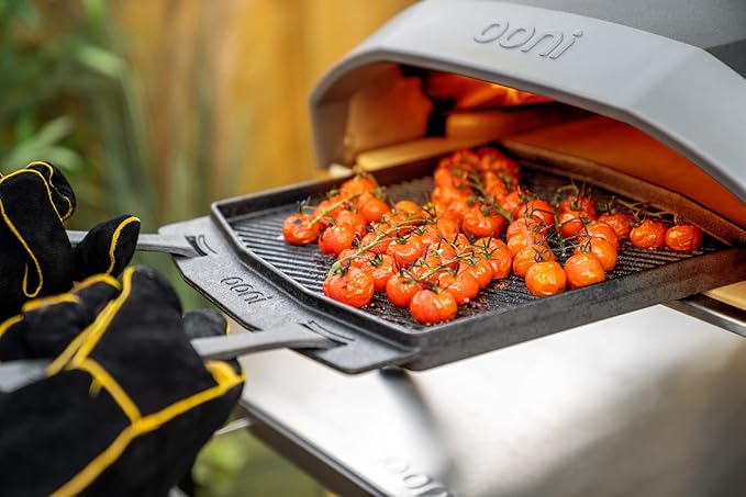 ooni Cast Iron Dual-Sided Grizzler Plate - 13.6" x 12.5" Reversible Griddle with Removable Handle and Stainless Steel Trivet, Pre-Seasoned Non-Stick Oven Safe Cookware, Pizza Oven and BBQ Accessories