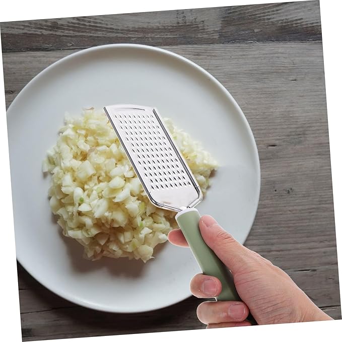PRETYZOOM Stainless Steel Garlic Mincer Zester Efficient Grating Tool for Garlic Ginger Cheese and Vegetables Versatile Kitchen Utensil Easy to Clean Design
