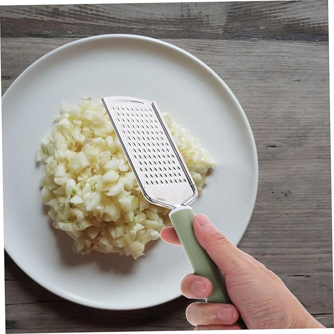 PRETYZOOM Stainless Steel Handheld Zester Multifunctional Garlic Mincer Tool with Ergonomic Handle for Efficient Grating of Garlic Ginger and Cheese Lightweight Kitchen Accessory