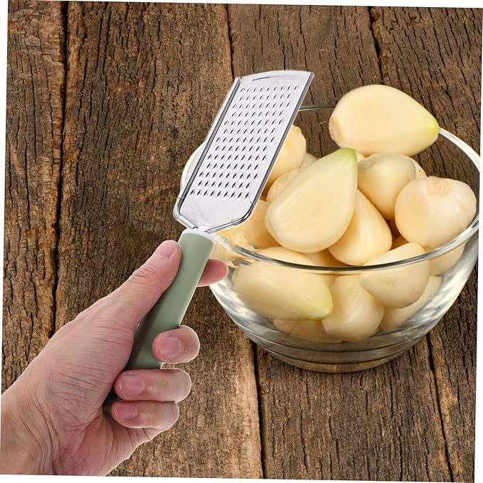 Unomor Stainless Steel Multifunctional Garlic Zester and Vegetable Chopper Efficient Grating Tool for Garlic Ginger and Cheese Easy to Clean and Lightweight Design for Kitchen Use