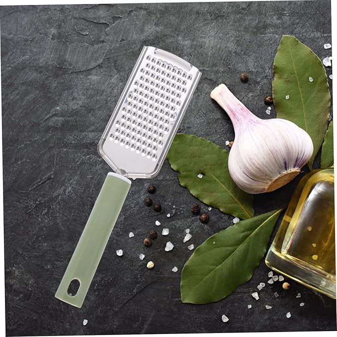 PRETYZOOM Stainless Steel Garlic Mincer Zester Efficient Grating Tool for Garlic Ginger Cheese and Vegetables Versatile Kitchen Utensil Easy to Clean Design