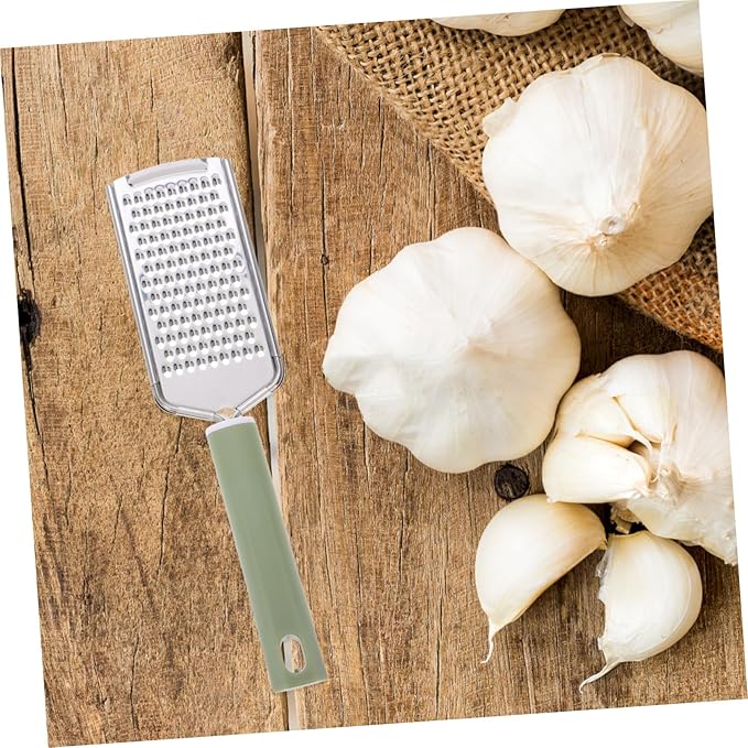 PRETYZOOM Stainless Steel Handheld Zester Multifunctional Garlic Mincer Tool with Ergonomic Handle for Efficient Grating of Garlic Ginger and Cheese Lightweight Kitchen Accessory