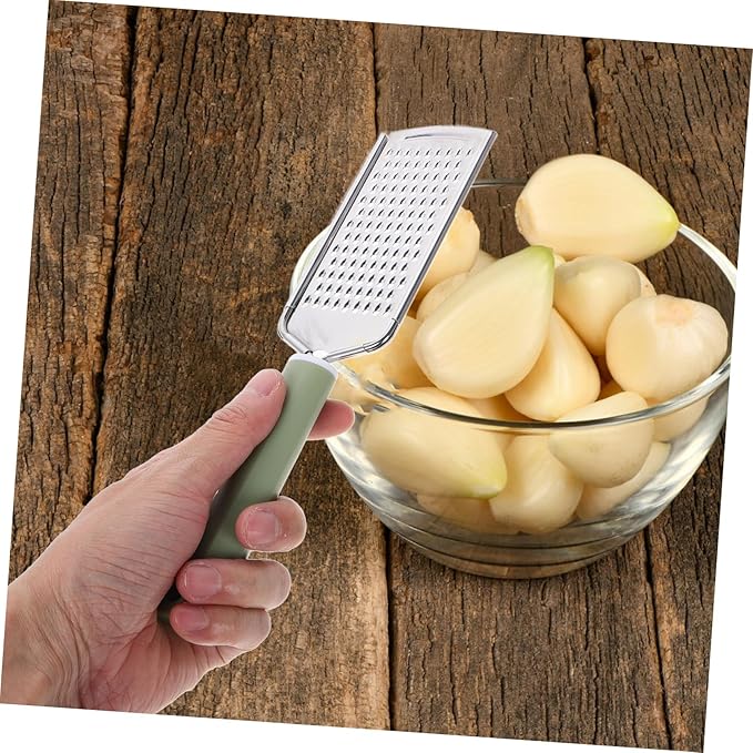 Stainless Steel Cheese Grater Garlic Zester Ergonomic Handheld Kitchen Tool for Efficient Grating of Garlic Ginger and Cheese Easy to Clean Comfortable Grip