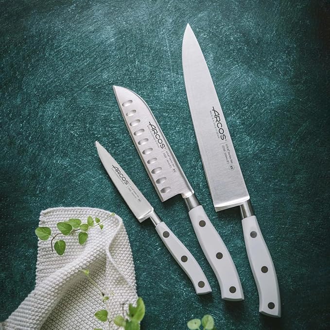 Arcos Forged Knife 3 pieces - Nitrum Stainless Steel and mm blade. 613 gr. Ergonomic Polyoxymethylene POM Handle. Series Riviera Blanc. Thin blade with a characteristic smooth edge. Color White