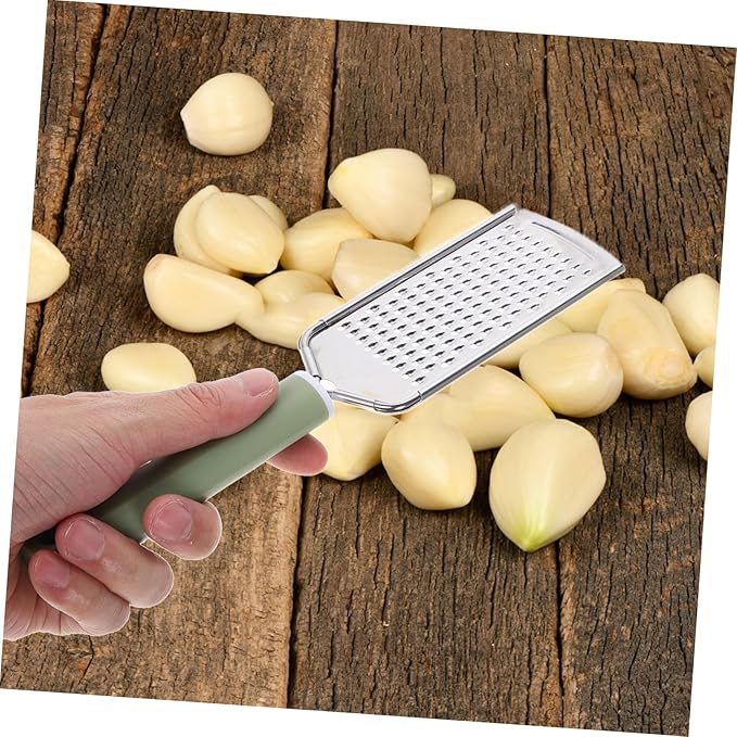 PRETYZOOM Stainless Steel Garlic Mincer Zester Efficient Grating Tool for Garlic Ginger Cheese and Vegetables Versatile Kitchen Utensil Easy to Clean Design