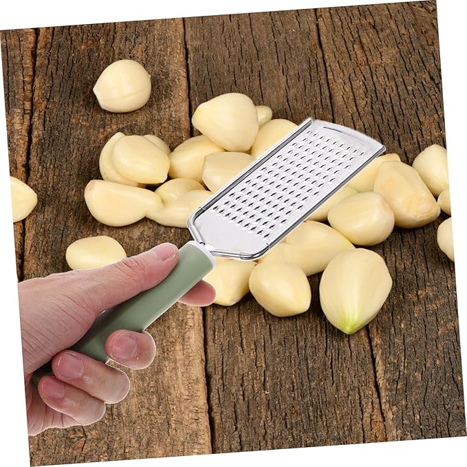 PRETYZOOM Multifunctional Garlic Shredder and Cheese Zester 1-Piece Stainless Steel Garlic Press for Chopping Vegetables Cooking and Lemon Grating for Home Use