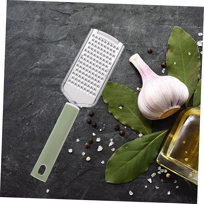 Unomor Stainless Steel Multifunctional Garlic Zester and Vegetable Chopper Efficient Grating Tool for Garlic Ginger and Cheese Easy to Clean and Lightweight Design for Kitchen Use