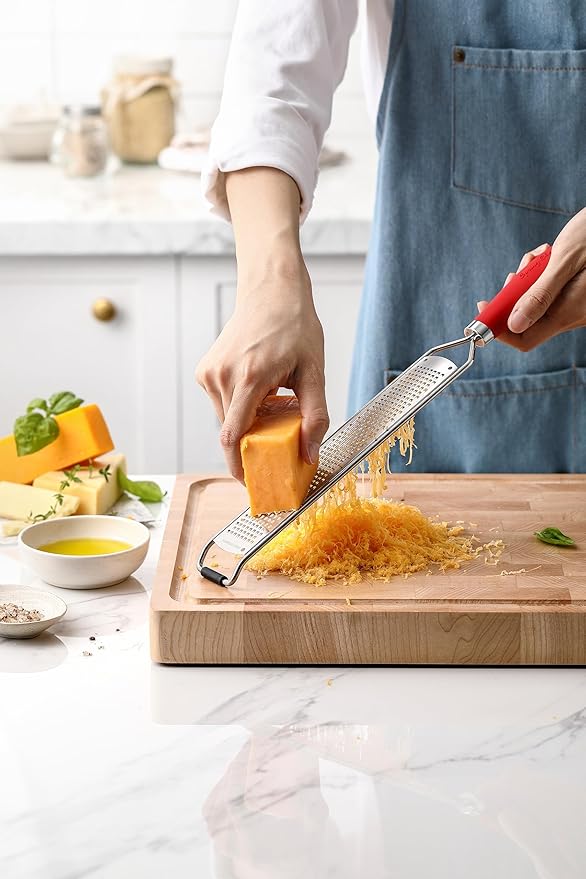 Spring Chef Stainless Steel Lemon Zester Grater with Handle - Garlic, Cheese, Parmesan, Nutmeg, Lime, Ginger Grater - Heavy Duty Kitchen Tool - Citrus Zester with Blade Cover - Fine Shred - Red