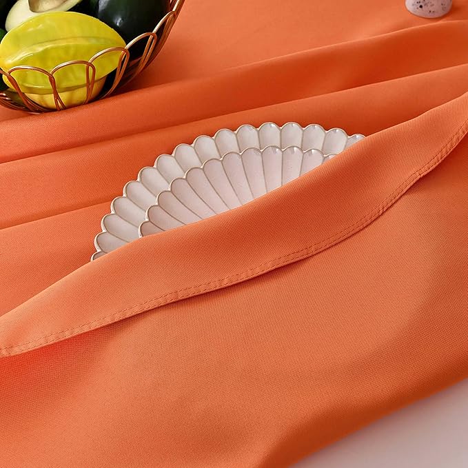 MEANMOY 2 Pack Orange 210 GSM Water & Stain Resistant Round Tablecloth - Solid 70 Inch Circle Table Cloth Cover in Wrinkle Free Washable Wipe Clean Polyester for Wedding, Party, Banquet (2 Pcs)