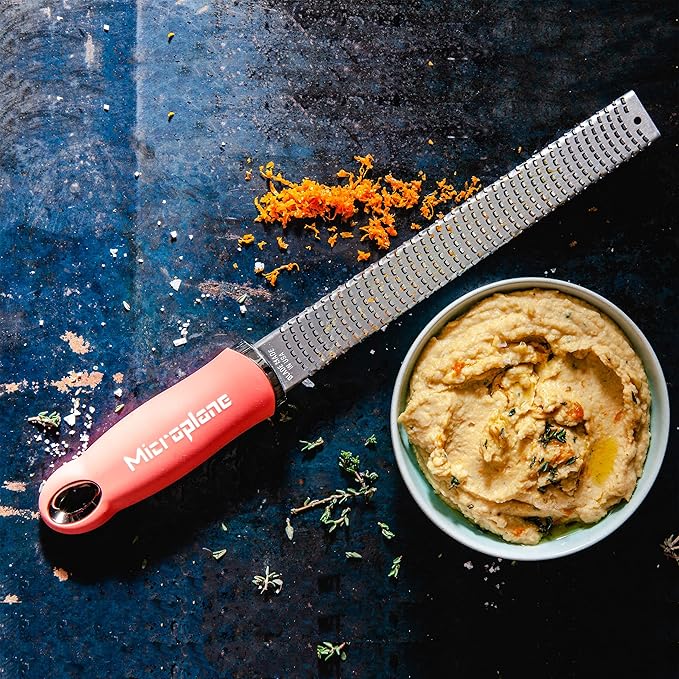 Microplane Zester Grater in Coral for Citrus Fruits, Hard Cheese, Ginger, Chocolate and Nutmeg with Fine Stainless Steel Blade - Made in USA